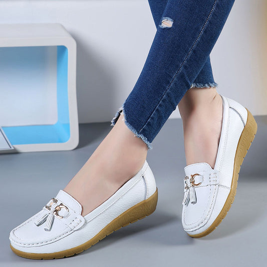 Chaussures compensées à semelle souple en cuir creux pour femmes